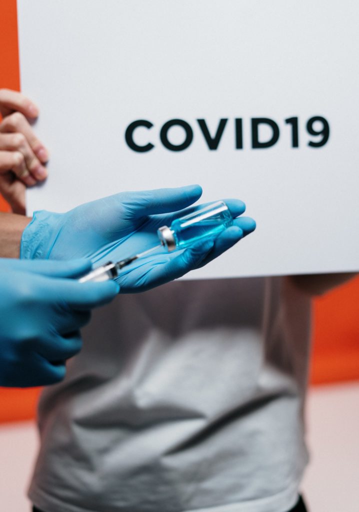 COVID-19 vaccine representing jury trials