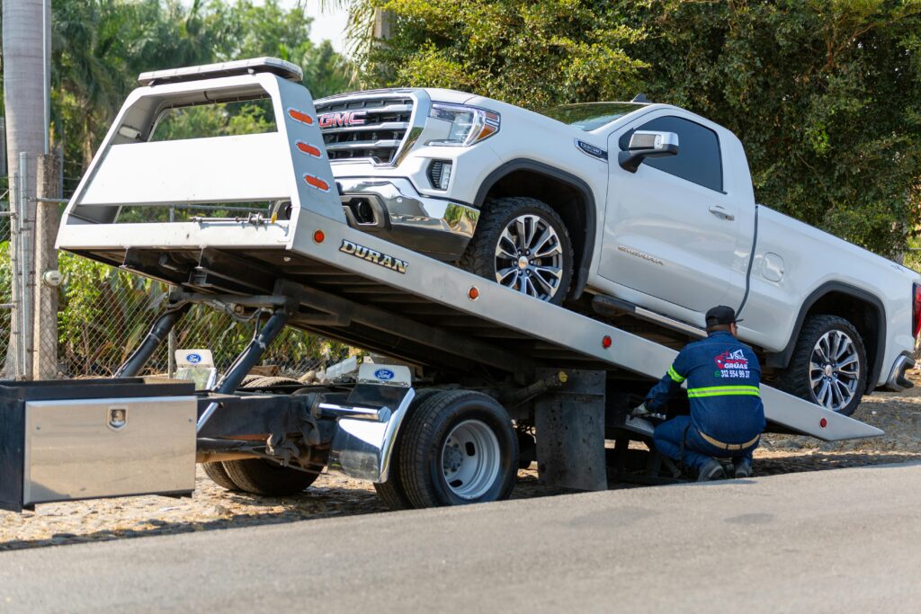 Pick up truck being towed representing passenger personal injury claims